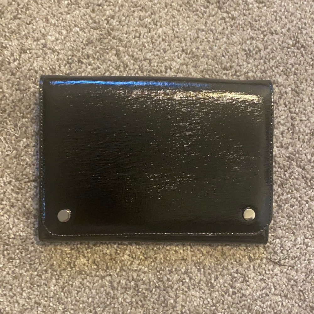 silver chain black bag